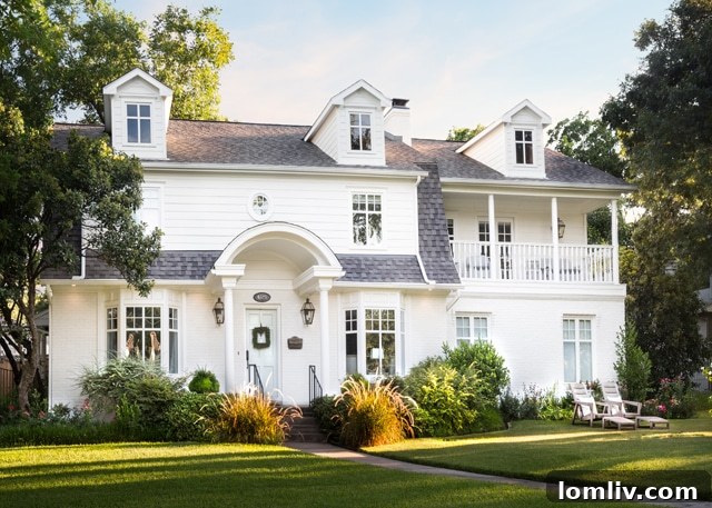 The charming exterior of the vintage Dutch Colonial home at 6521 Bob O Link Dr., showcasing its meticulously maintained facade.