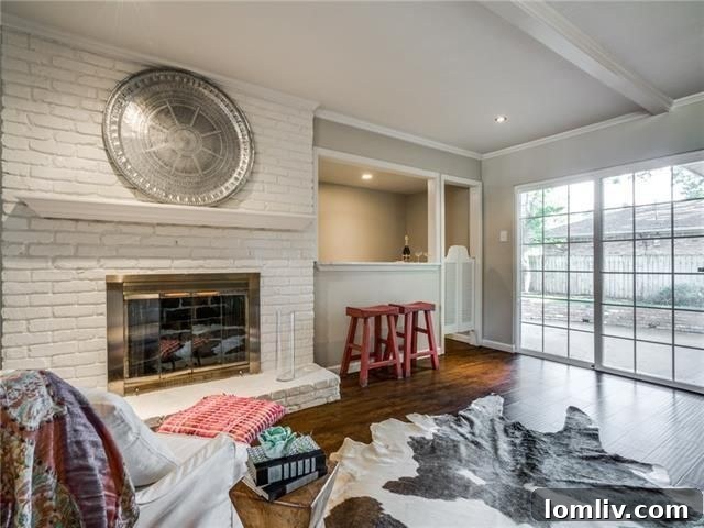 Radiant North Highlands Estate Steals the Show at Dallas Open Houses This Weekend 20 Modern kitchen with marble countertops and dark Shaker cabinets at 5852 Clendenin Ave.