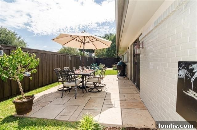 Outdoor oasis with swimming pool, spa, and firepit at 6935 Echo Bluff Dr.