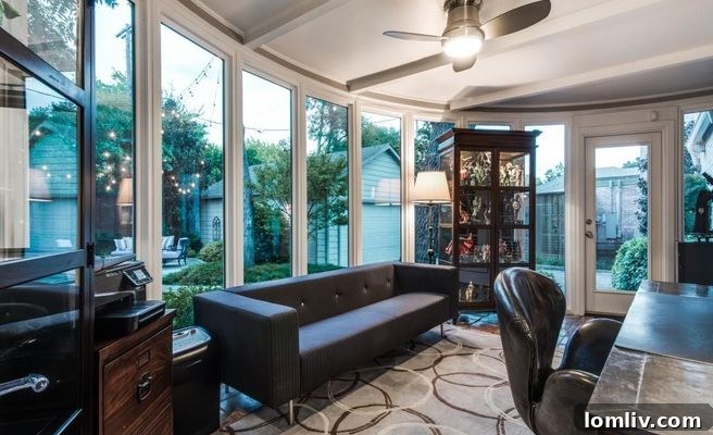 Bright Solarium Overlooking Backyard Patio