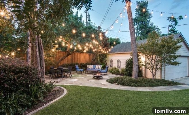 Backyard View of Home and Detached Garage