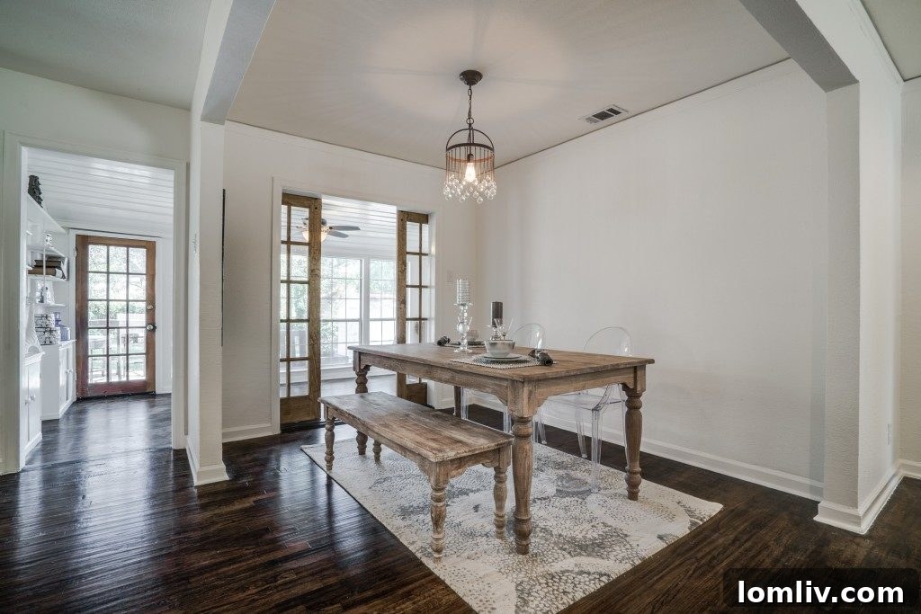 An inviting living area at 1022 Cordova St. after renovation, showcasing bright spaces and classic details.