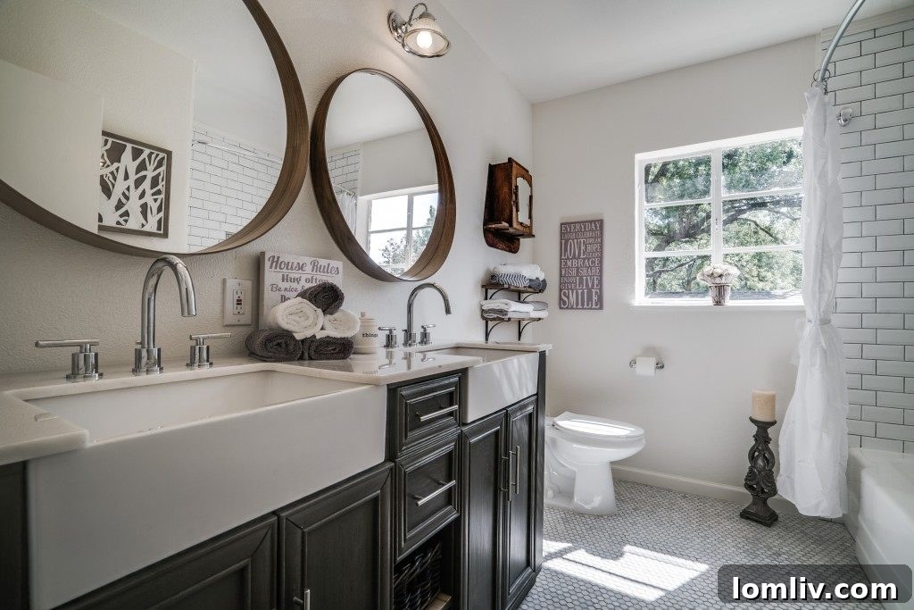 The tastefully renovated bathroom at 1022 Cordova St., featuring elegant fixtures and a timeless design.