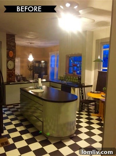 Interior view of the 4317 Worth St. Victorian after renovation, showcasing restored architectural details.