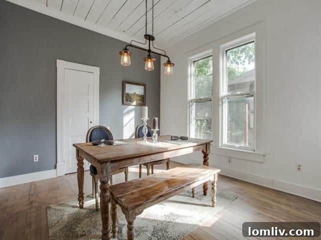 Close-up of the shiplap ceiling at 4317 Worth St., highlighting Martin's dedication to preserving original materials.