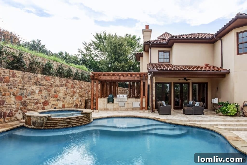 Mira Vista: What Every Buyer Wants 5 Newly added outdoor living area at 6808 Shadow Creek Court featuring a serene pool, spa, and expanded yard space