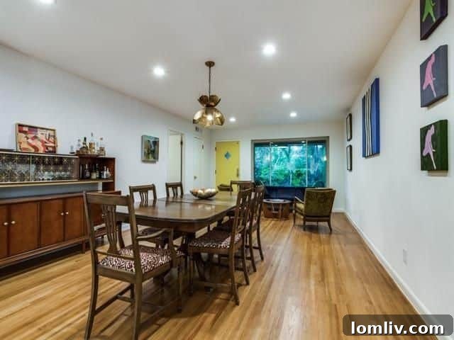 Bright and Modern Living Room with Refinished Hardwoods