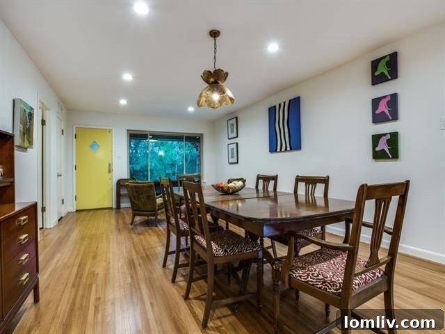 Elegant Dining Area with Greenbelt Views and Recessed Lighting