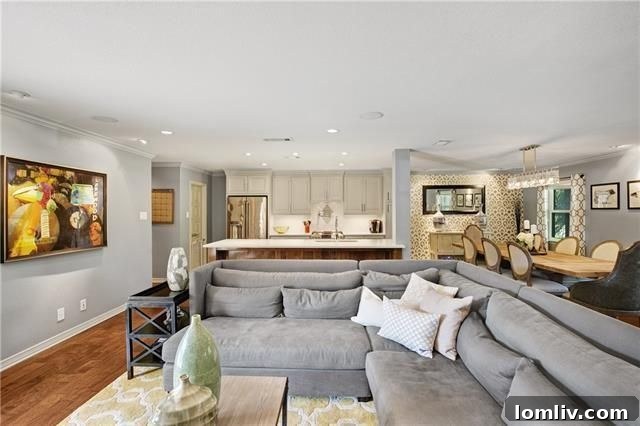 Expansive outdoor kitchen with fireplace and seating area.
