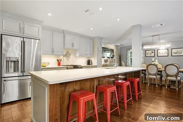 Stylish open-concept living room and kitchen area.