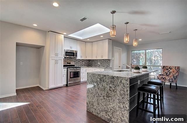 Contemporary dining area adjacent to the kitchen in 15612 Regal Hill Cir.