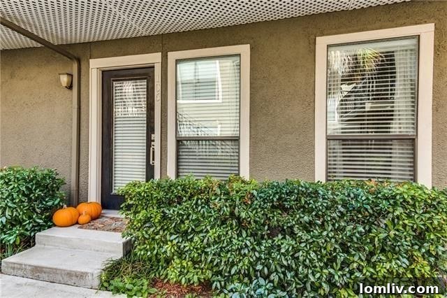 Another perspective of the exterior and community grounds of Veneto Condominiums