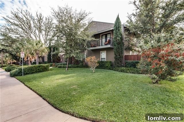 Lush Mediterranean landscaping and pathways within the Veneto Condominiums complex