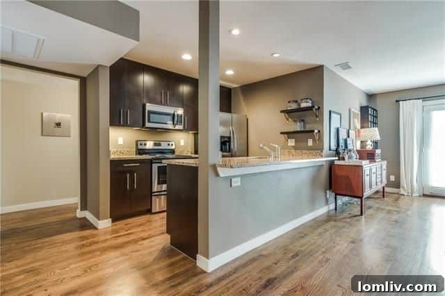 Detail of the unique see-through wood-burning fireplace, a centerpiece of the condo