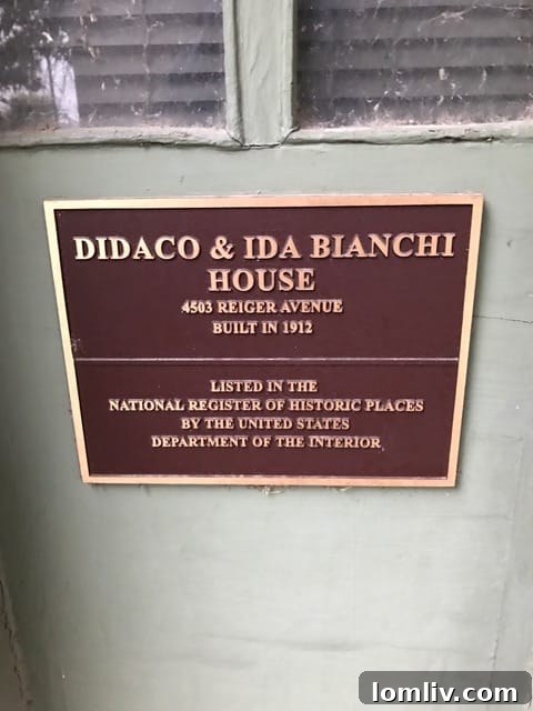 A historic plaque detailing the Bianchi House's significant contribution to Dallas's architectural heritage.