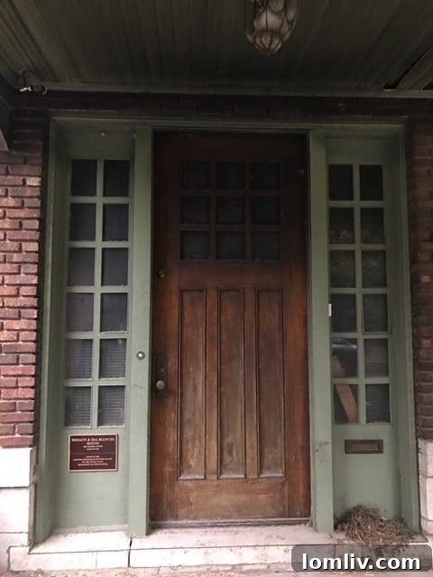 The unique and intricately designed entrance door of the historic Bianchi House.