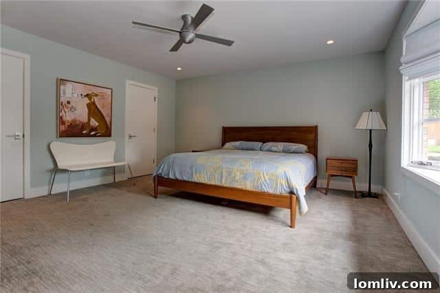 Master Bedroom with blue walls and carpet