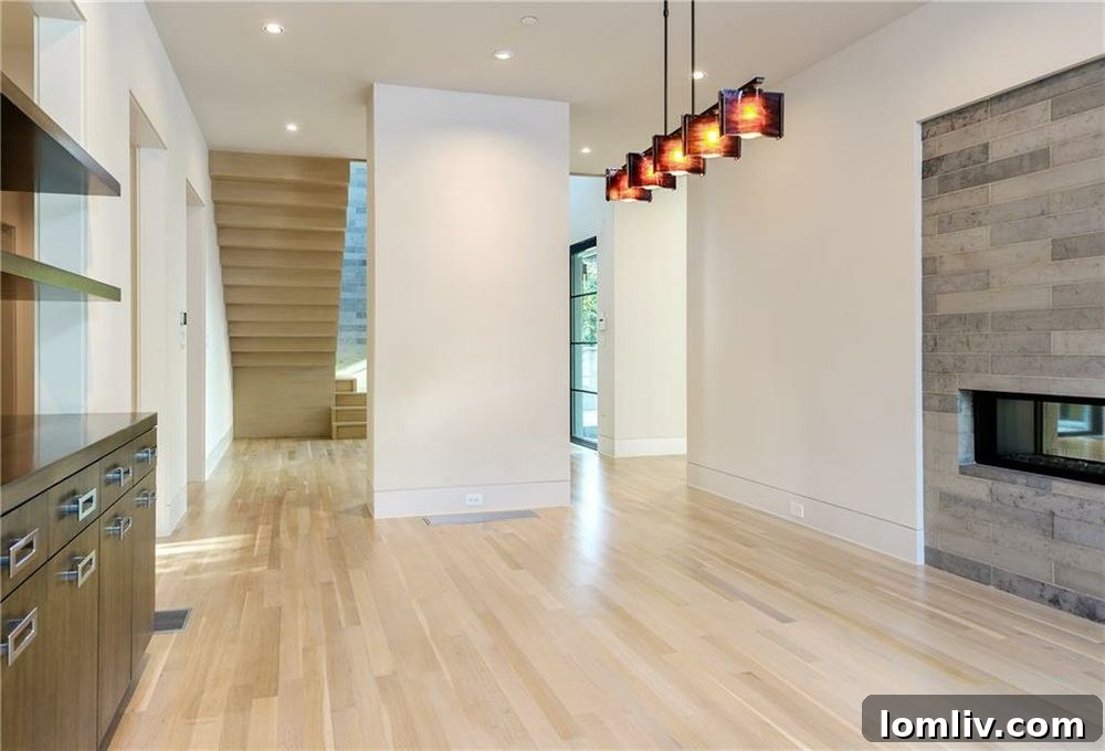 Formal dining area showcasing contemporary design and spaciousness