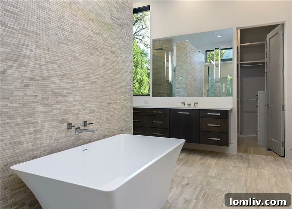Modern master bathroom vanity with dual sinks and contemporary fixtures