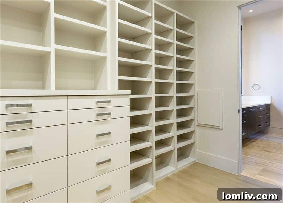 Custom-designed master closet with extensive built-ins and storage