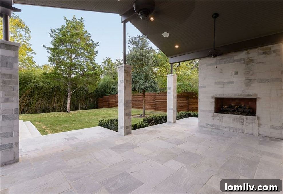 Outdoor patio with fireplace, perfect for relaxation and entertaining