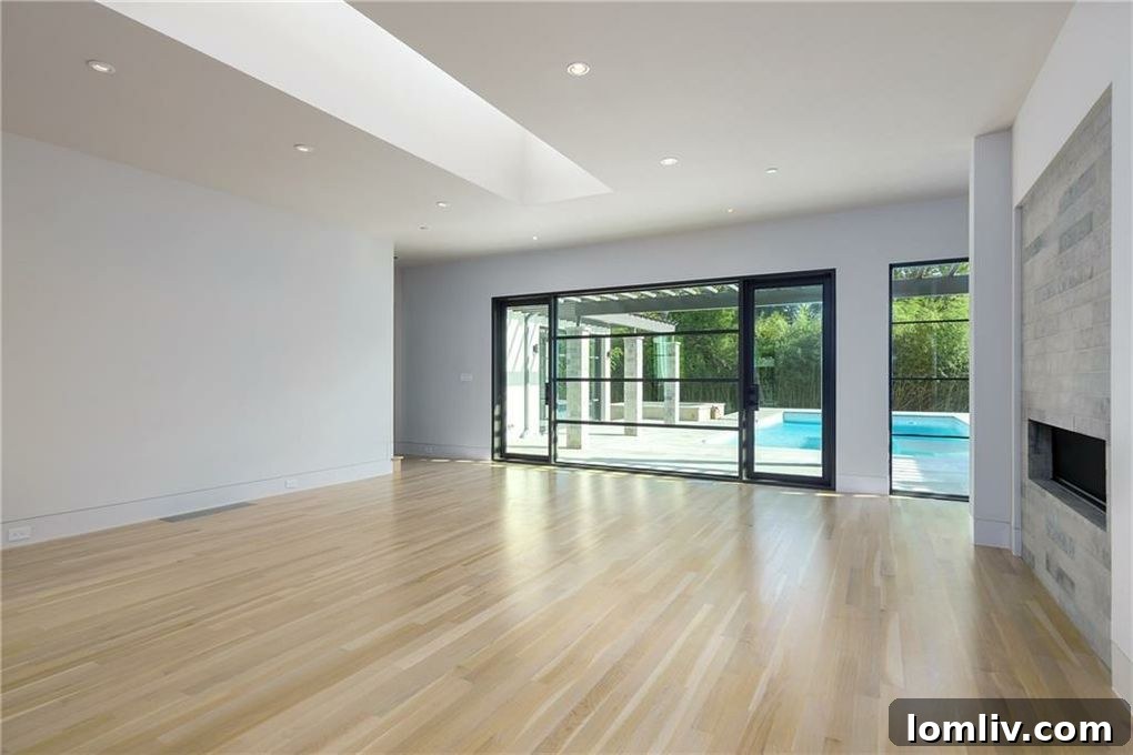 Contemporary living space with views to the outdoors in Dallas luxury home