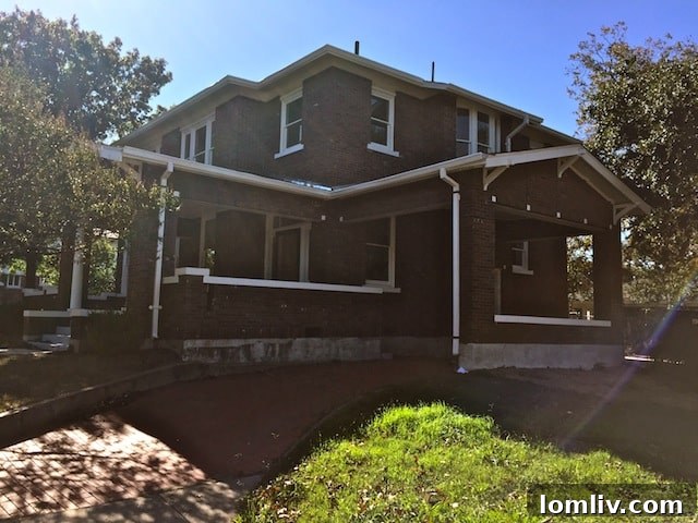 Transformed exterior of the historic Ryan Place home, showcasing Brent Hull's successful architectural restoration