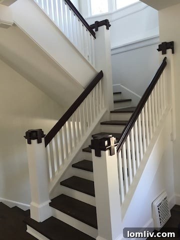 Living area showing excellent circulation around the fireplace and preserved original architectural elements