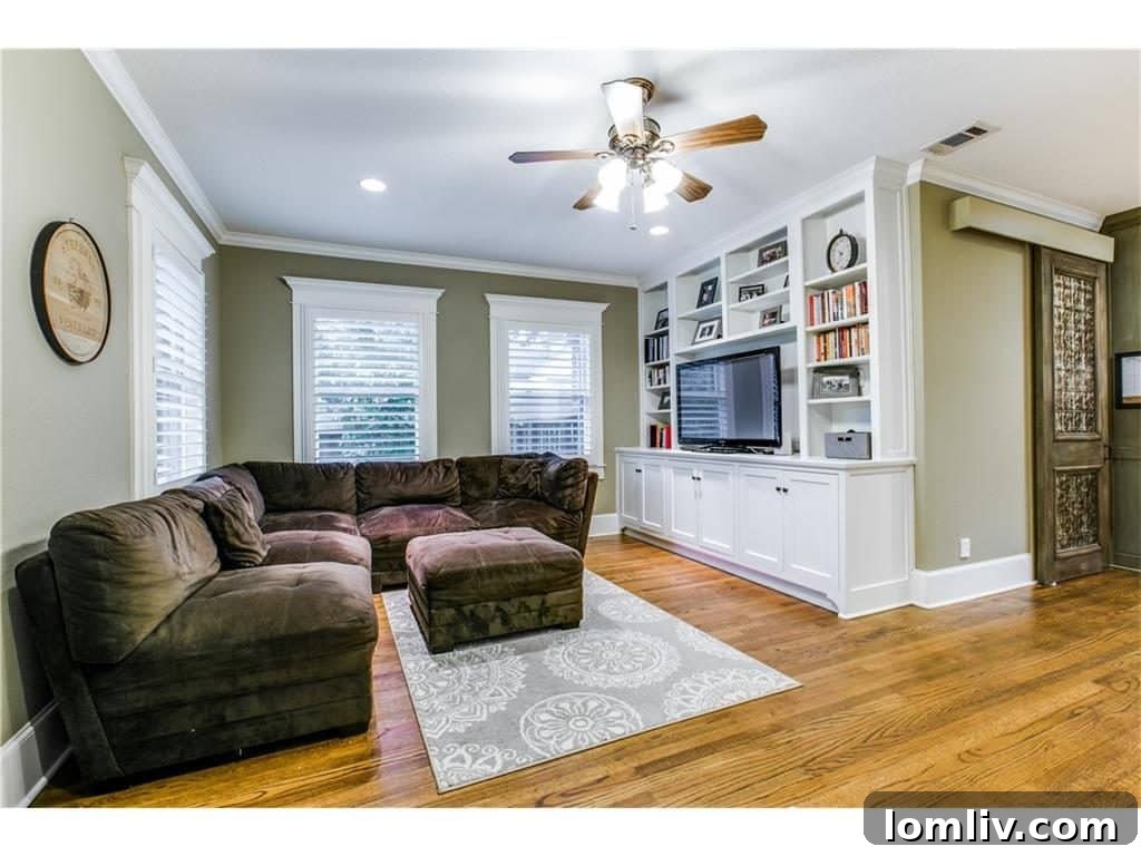 Open-plan family room flowing into the kitchen