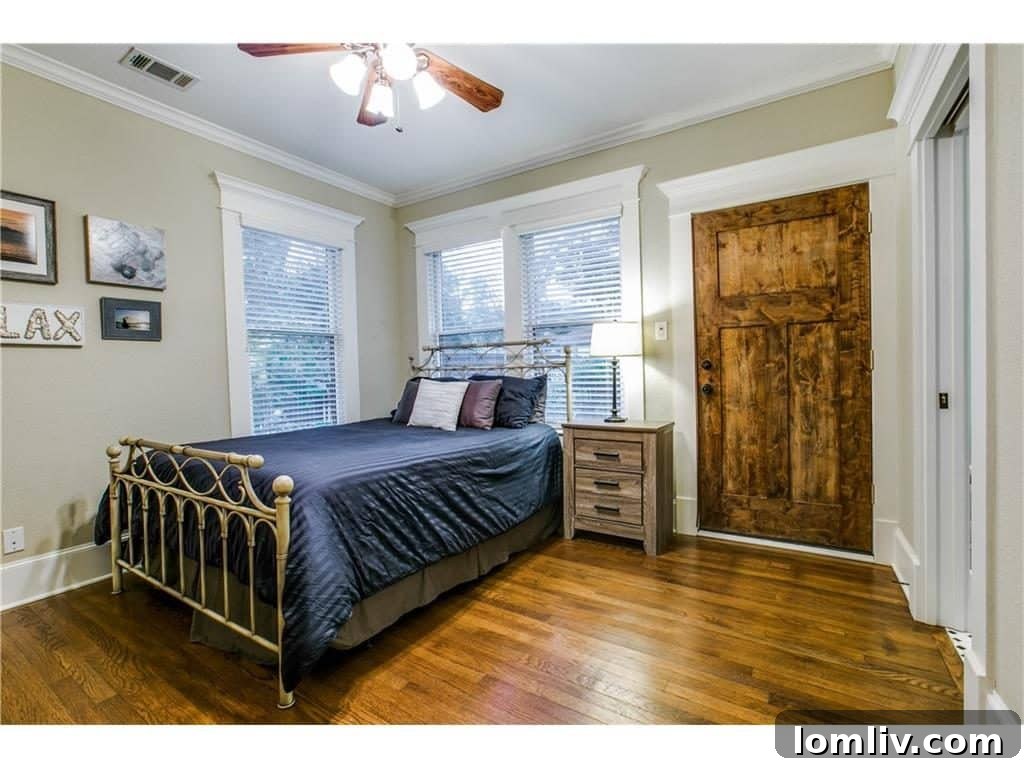 Luxurious bedroom with ensuite bathroom entrance