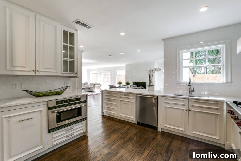 Expansive gourmet kitchen with high-end appliances and island