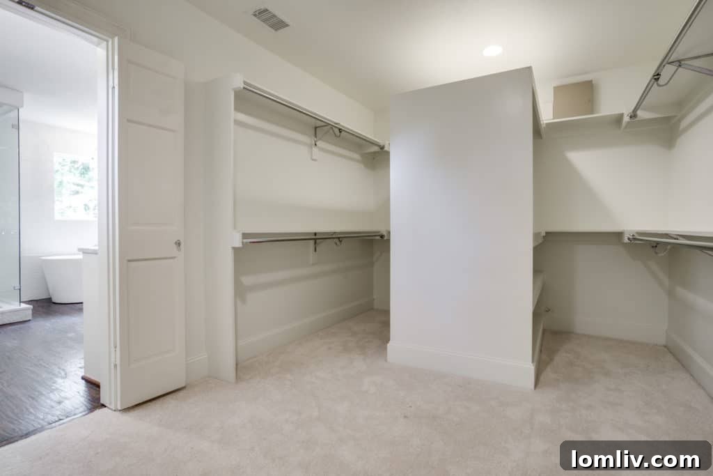 Large walk-in closet with custom storage solutions