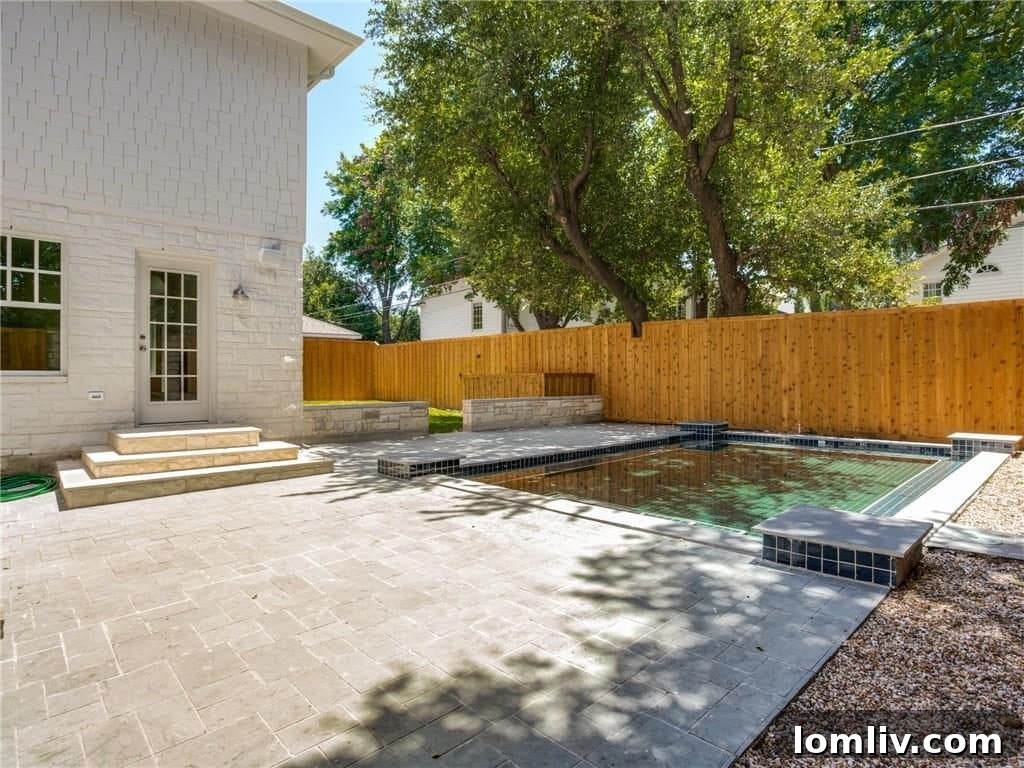 Sparkling backyard pool with ample space for entertaining