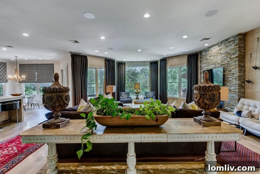 Main living area with floor-to-ceiling windows and fireplace