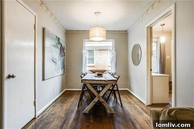 Master bedroom with clerestory windows and hardwood floors