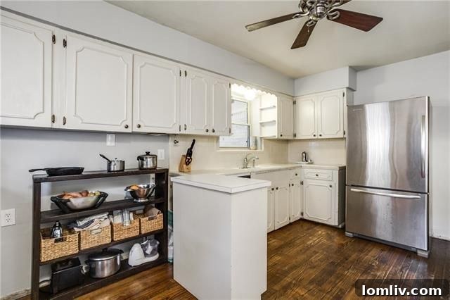 Renovated master bathroom with new vanity and herringbone backsplash