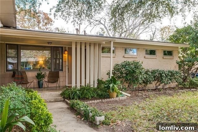 Exterior view of 214 Leda Drive showing the front yard