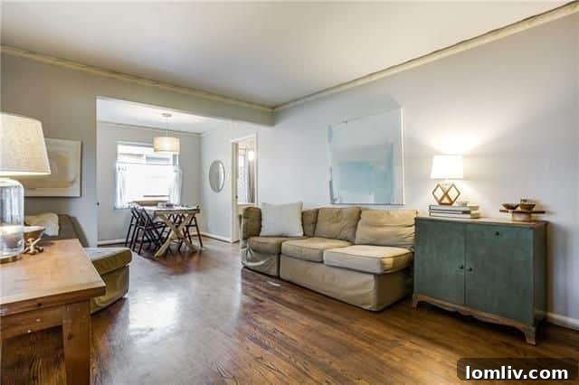 Bright living room with hardwood floors and natural light