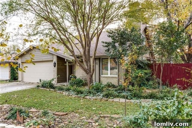 Creekside Home at 10930 Listi Dr in Lake Highlands