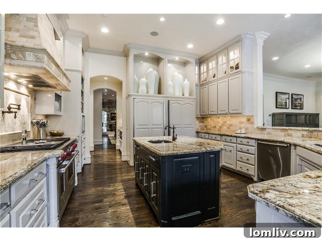 Custom cabinetry and high-end cooking range in a luxury kitchen