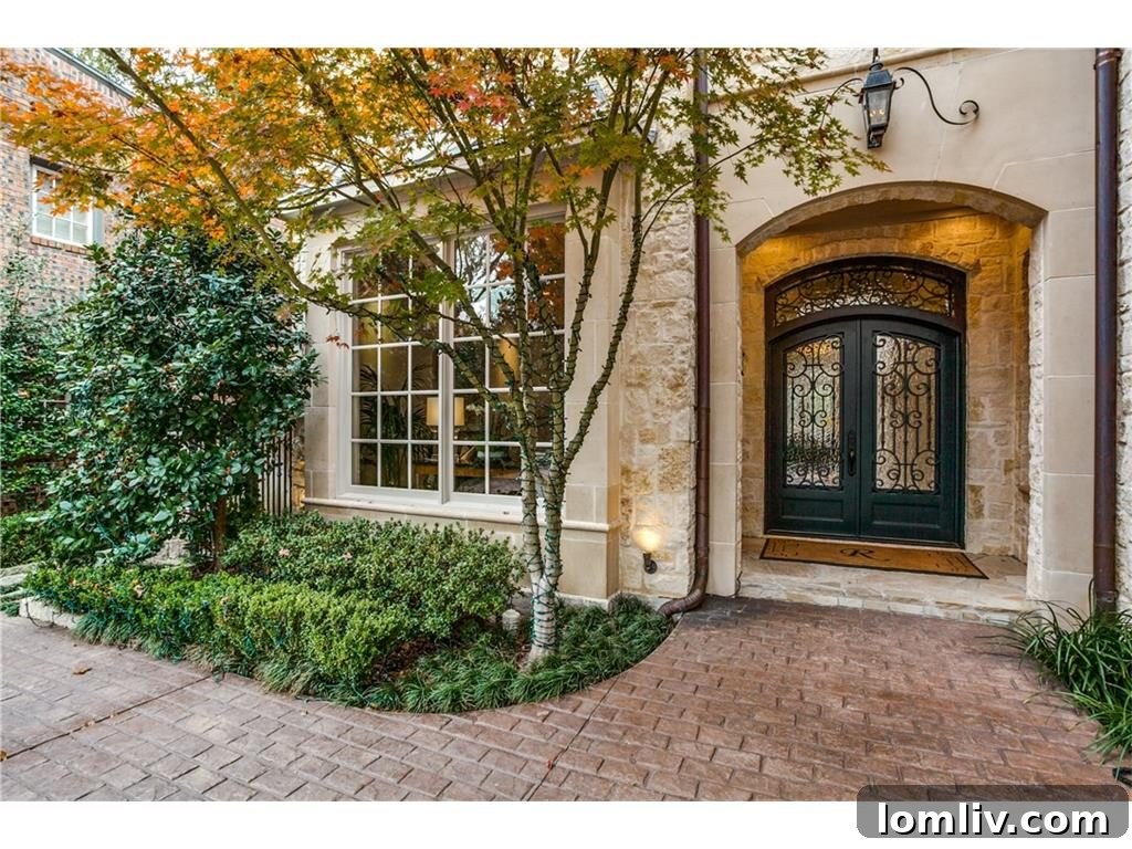 University Park home with elegant pool and outdoor living space backing onto Turtle Creek