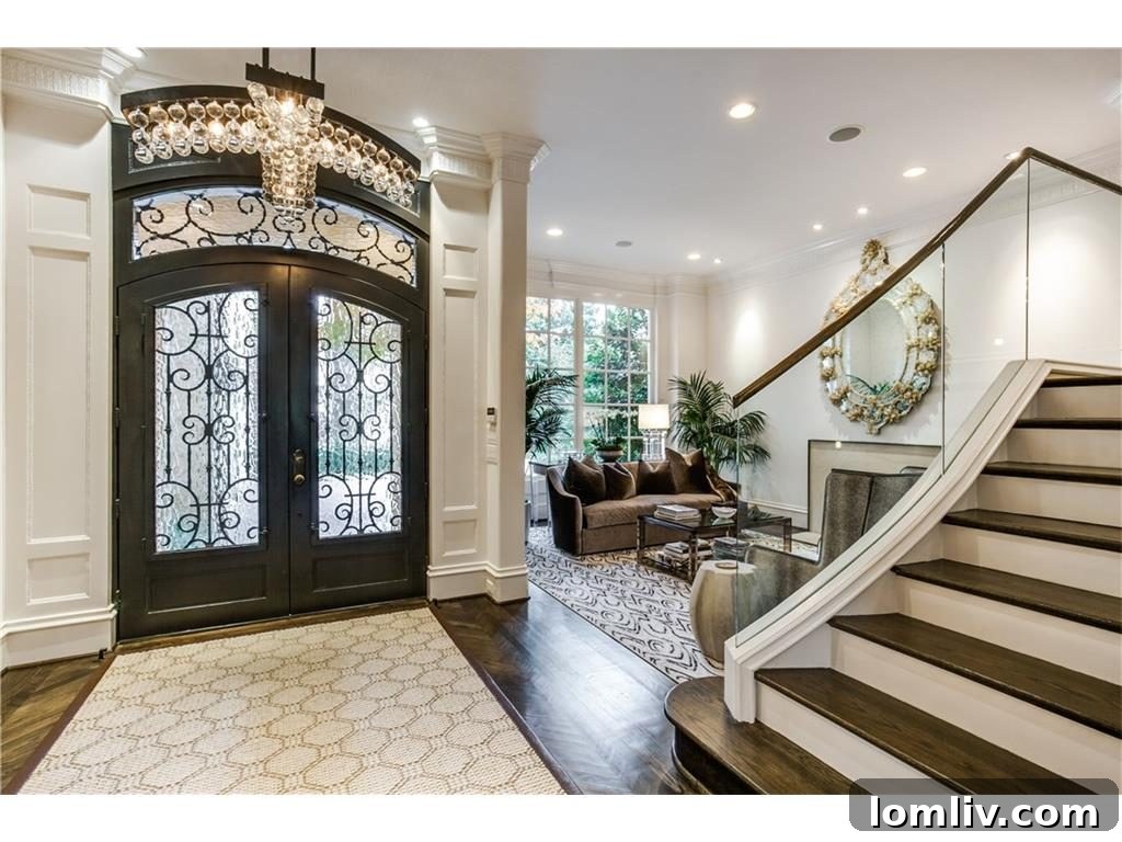 Modern glass-paned staircase in a luxury Dallas University Park home