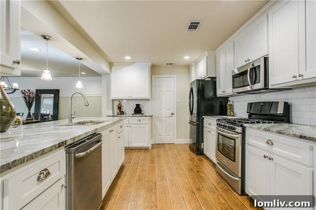 Dallas Open House Spotlight: A Masterpiece Craftsman in Junius Heights 19 Spacious living area with hardwood floors at 7741 Eagle Trl