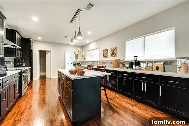 Dallas Open House Spotlight: A Masterpiece Craftsman in Junius Heights 5 Spacious dining area adjacent to kitchen at 725 Lowell St