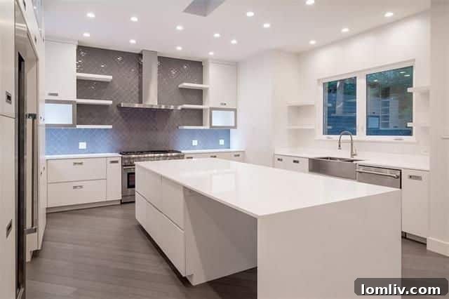 Dallas Open House Spotlight: A Masterpiece Craftsman in Junius Heights 10 Gourmet kitchen with waterfall island and quartz counters at 1547 Eastus Dr