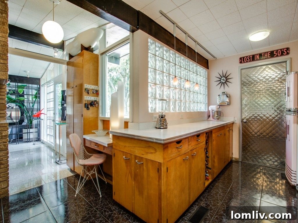 Unique round window in the master bedroom with a distinctive starburst design.