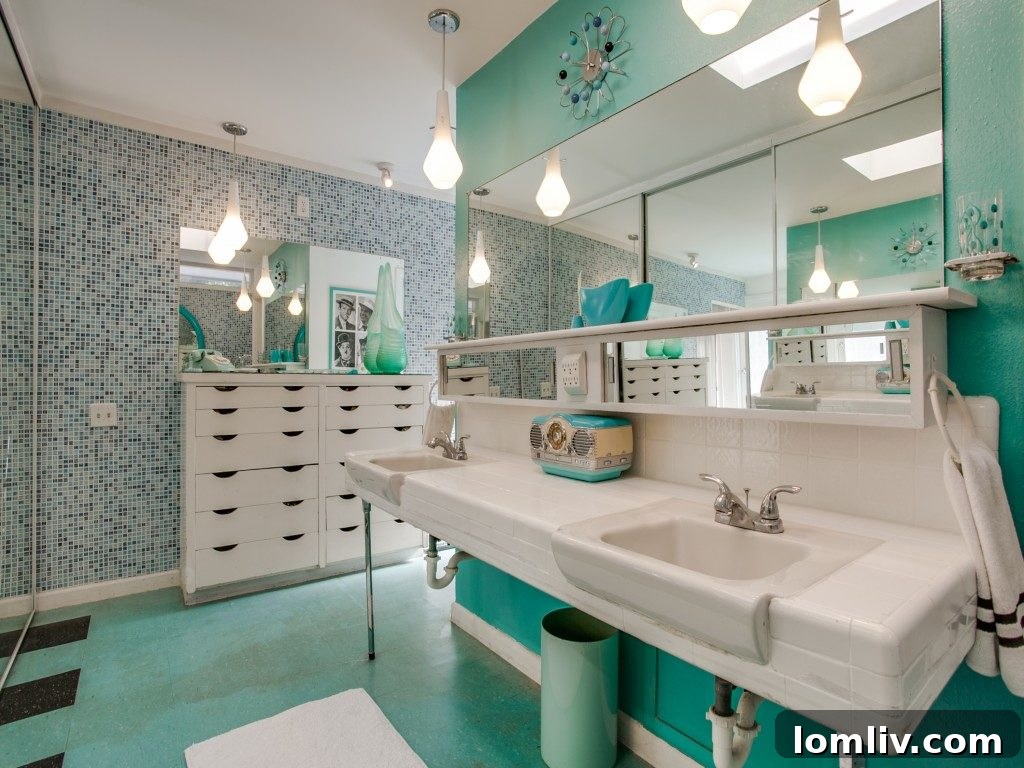 The refreshing swimming pool and expansive outdoor living area, ideal for entertaining.