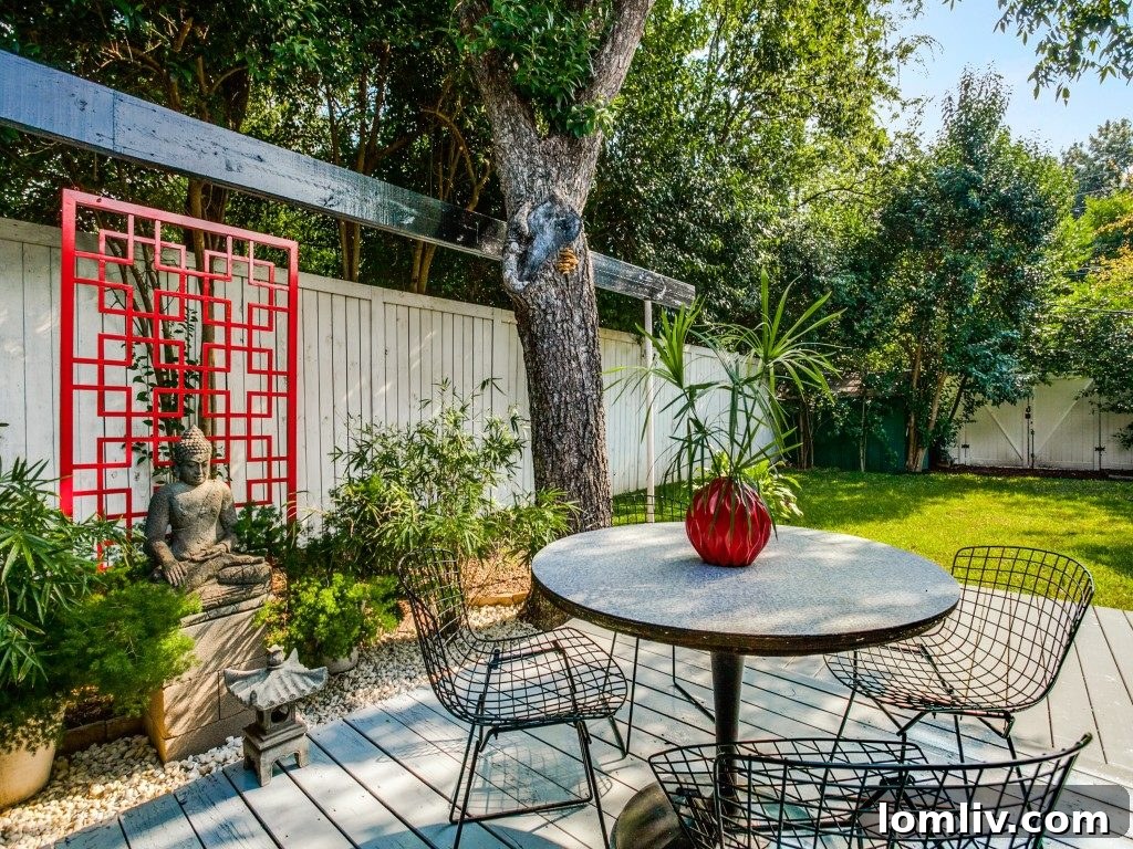Another angle of the pool and terraced decks, showcasing the spacious outdoor area.