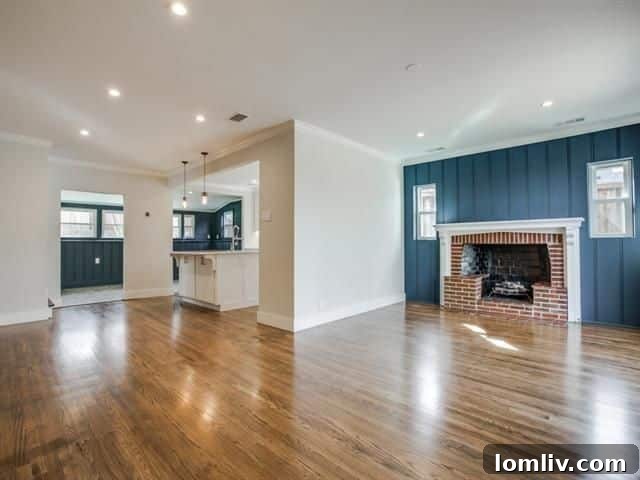 Inviting front exterior of 1230 Elmwood Blvd with mature trees