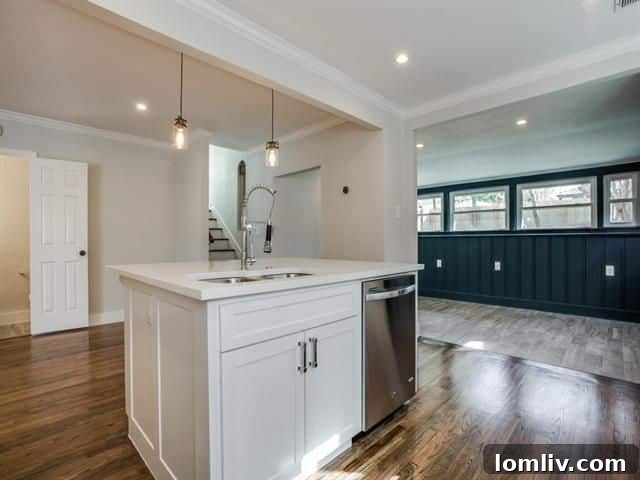 Elegant living room with original fireplace and dark walls